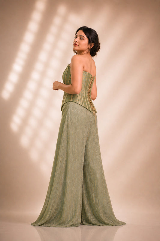 Sage green brocade corset co-ord set, back view showing lace-up corset detail and shimmer palazzo train, occasion wear by Label Neha Sinha