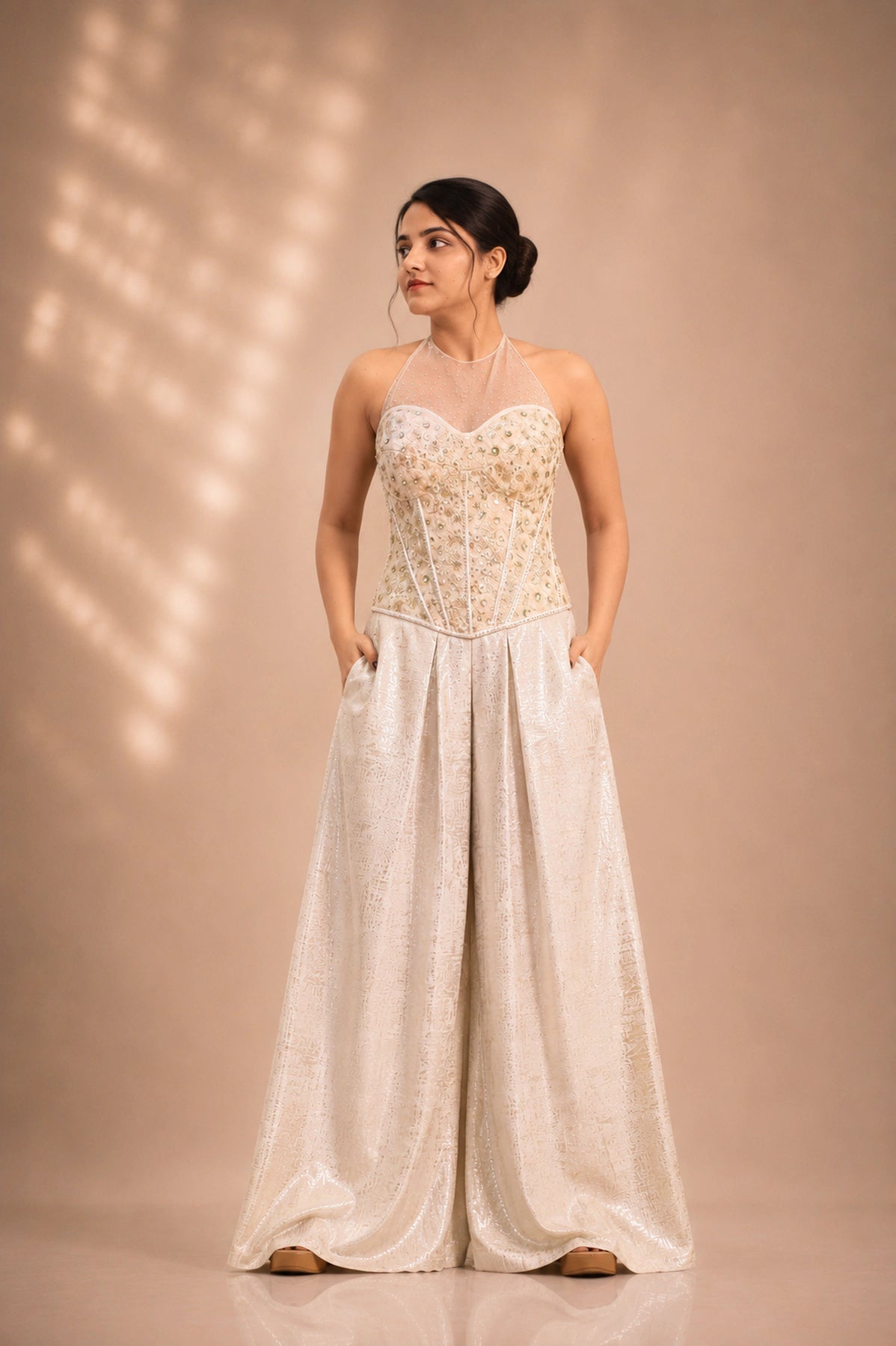 Ivory net corset with beaded embroidery and shimmer palazzo pants, front view, occasion wear by Label Neha Sinha