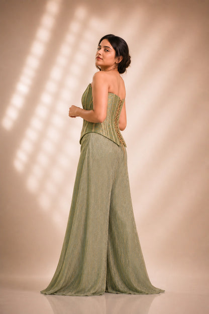 Sage green brocade corset co-ord set, back view showing lace-up corset detail and shimmer palazzo train, occasion wear by Label Neha Sinha
