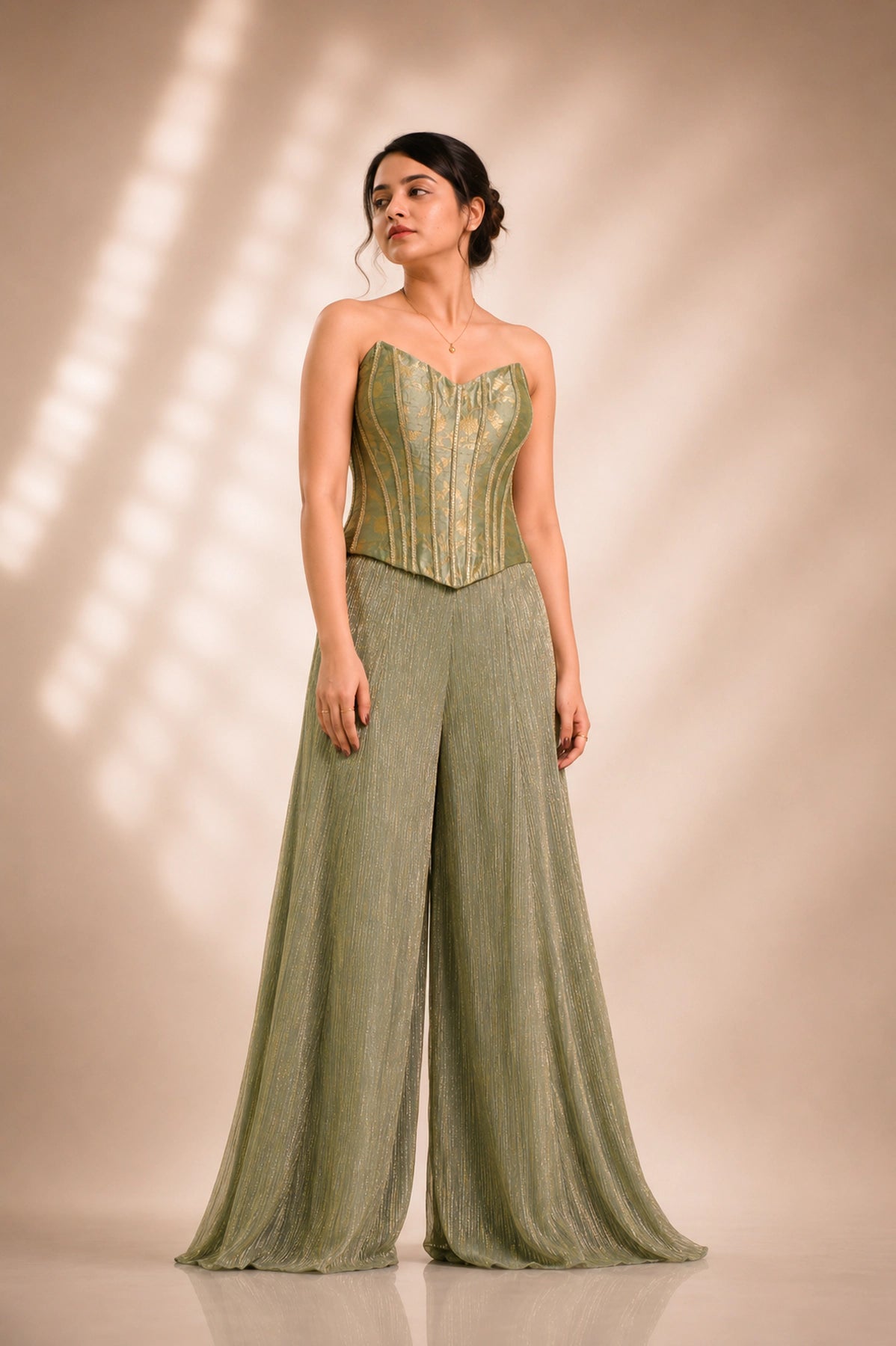 Sage green brocade corset co-ord set, front view with sweetheart neckline and shimmer palazzo pants, occasion wear by Label Neha Sinha