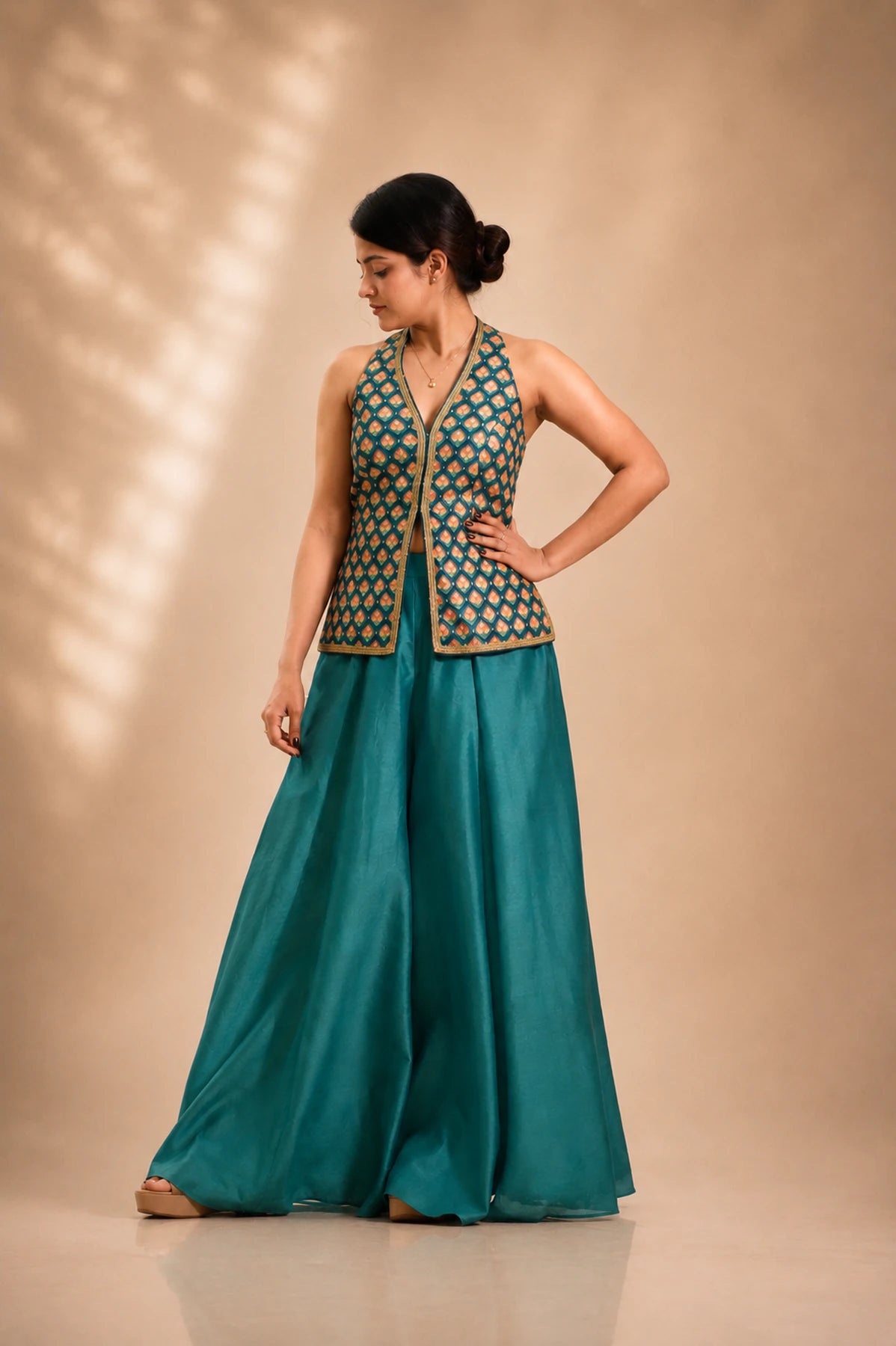Peacock teal printed halter jacket and palazzo co-ord set, side view, occasion wear by Label Neha Sinha